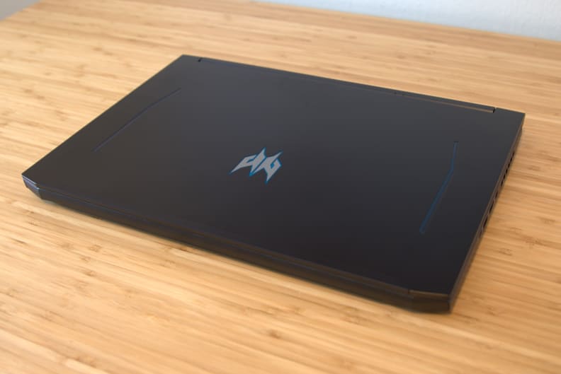 An Acer Predator Helios 300 gaming laptop on a desk.
